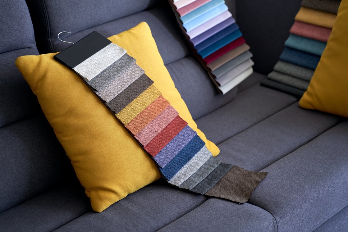 Colorful Upholstery Fabric Samples on the Sofa